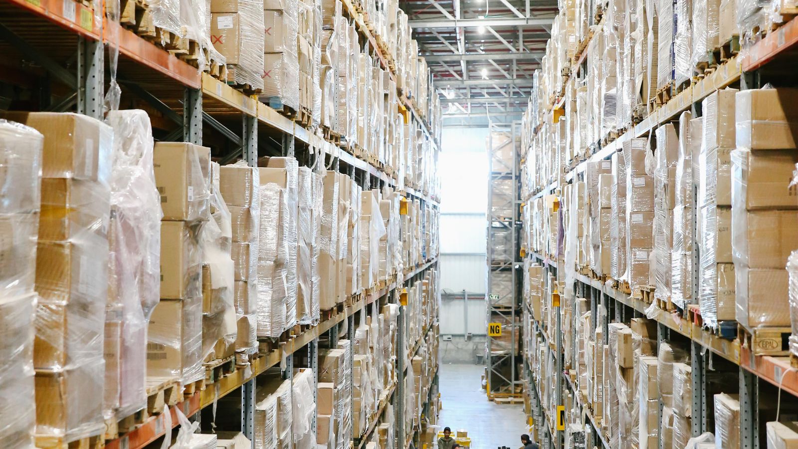 Boxes stacked on warehouse shelves ready for inventory counting