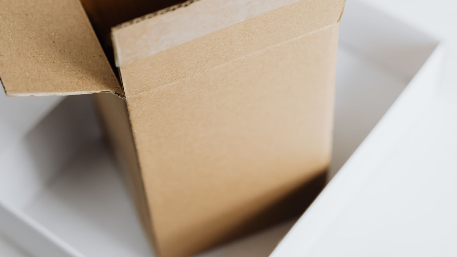 Stacked carton boxes ready for packing and shipping orders